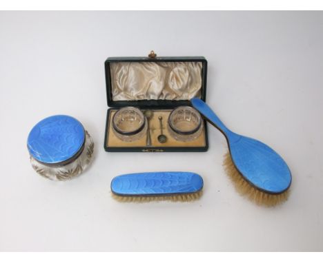 Three piece 1930s silver and guiloche enamel dressing set, comprising two brushes and a powder jar; together with a cased pai