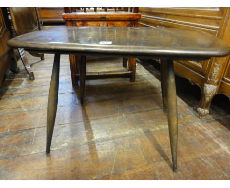 Ercol dark elm coffee table, the rectangular top upon typical tapered legs, 69 cm long; together with a further Elgin Afromos