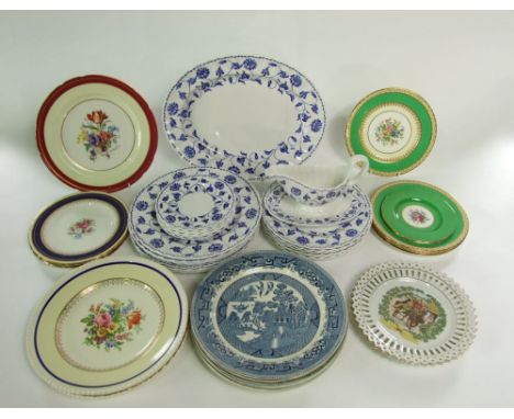 A collection of Spode blue and white printed Colonel pattern dinner wares comprising a sauce boat with integral stand, an ova