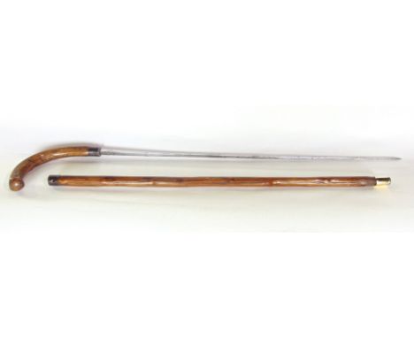 A Customs and Excise rummage stick 94cm long, used to check bales of goods for content and contraband