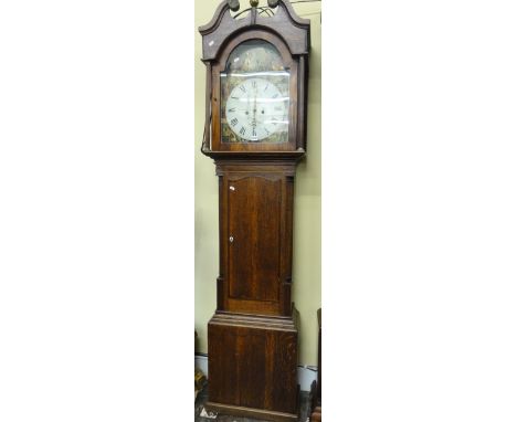 An early 19th century oak longcase clock, the hood with swan neck cornice enclosing a 35 cm broken arch painted dial showing 