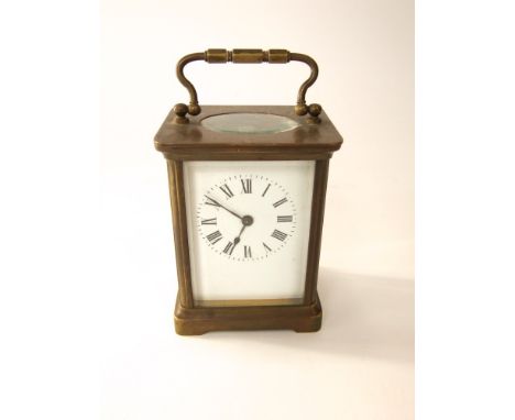 Brass carriage clock with cornice case, the movement inscribed 'ACC', 11cm high
