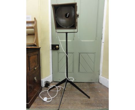 Vintage industrial MAJOR stage light upon a cast steel stand