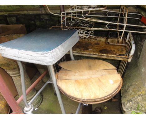 A Victorian cast iron machinist's/work stool with circular revolving seat and lions paw feet together with an Art Deco copper