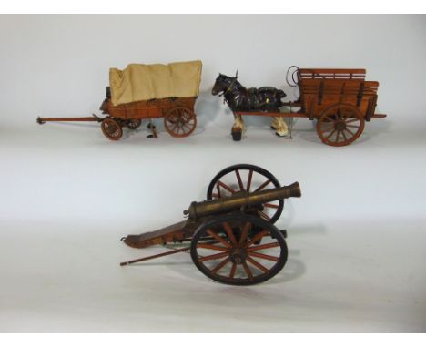 A collection of scratch built scale models to include a cannon, horse and cart and trailer wagon (3)