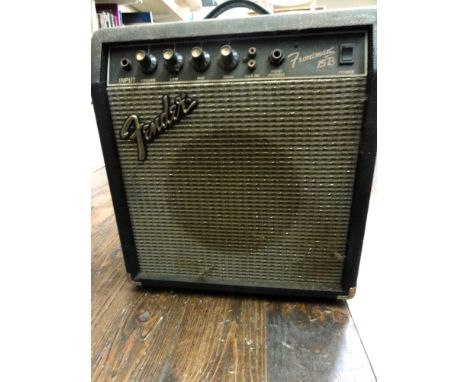 A Fender Frontman 15B amp, Serial Number IA03H12320-Type: PR497 together with a Fidelity cased record player.