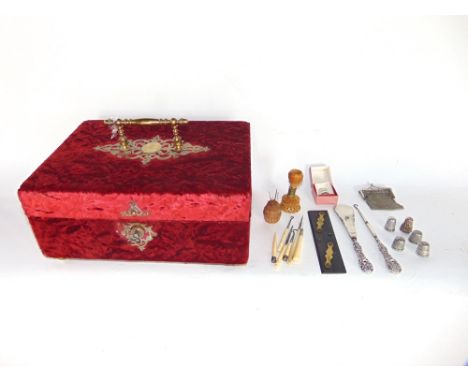 Antique red velvet sewing box with silk lined interior and a collection of various silver and other sewing tools, together wi