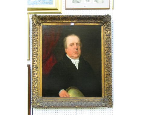 An early 19th century oil painting on canvas, half length portrait of a portly gentleman holding a terrestrial globe, inscrib