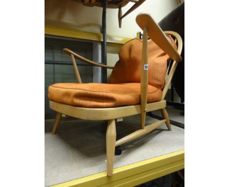 Pair of Ercol light elm stick back lounge chairs with burnt orange upholstery