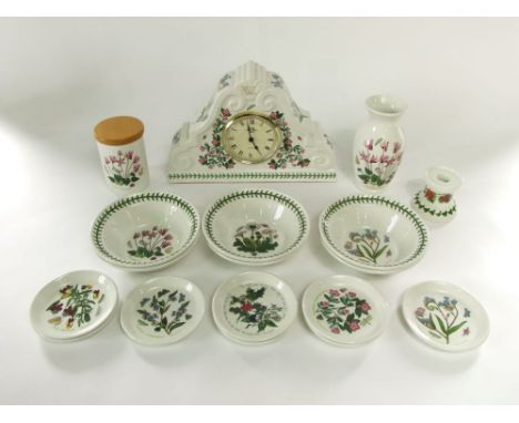 A collection of Portmeirion Botanic Garden wares including a ceramic mantel clock case fitted with a quartz movement, 32cm lo