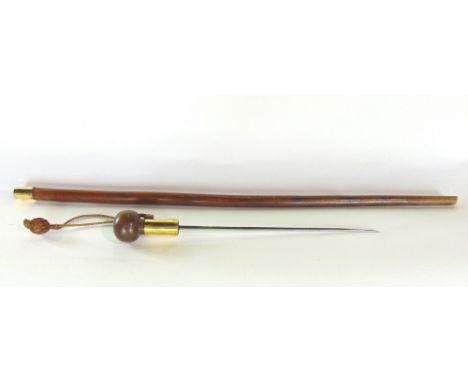Early 20th century dagger stick, with gilt metal band and tassel, 79cm long 