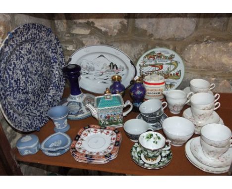 A substantial 19th century blue and white printed Brownfield meat plate of oval form with hummingbird and insect decoration t