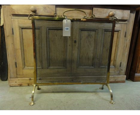 A good quality early 20th century brass framed firescreen with Art Nouveau detail and wire mesh panel together with a polishe