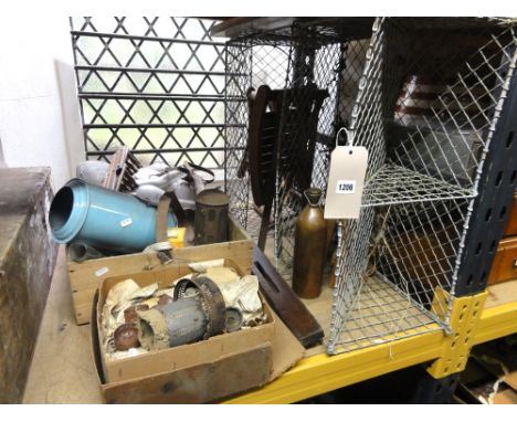 A vintage wall mounted wire work receptacle together with a selection of vintage oil lamp chimneys, lamp parts, small slatted