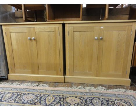 A pair of modern light oak side cabinets possibly by Habitat 86 cm high (2)
