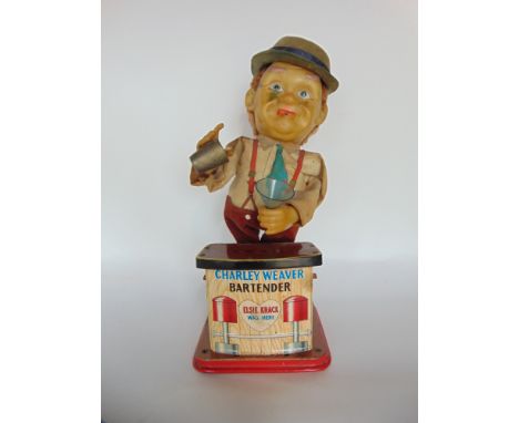 Vintage automaton figure inscribed Charley Weaver, bartender, 30cm high