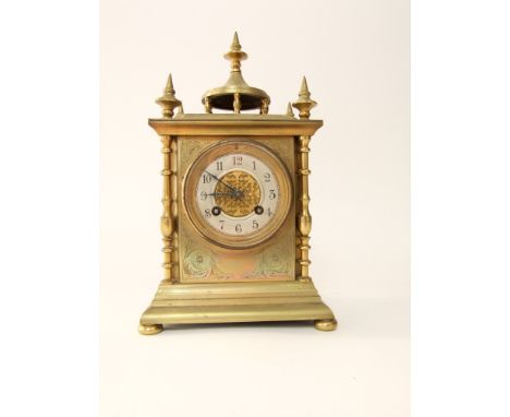 Good 19th century two train brass shelf clock, the architectural case with various Islamic finial's, with floral engraved bra