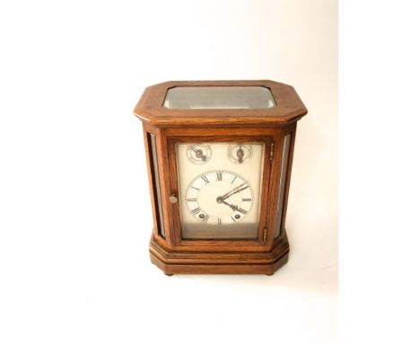 Good oak eight glass musical mantle clock, with two train dial, two further subsidiary dials, fitted with a movement striking