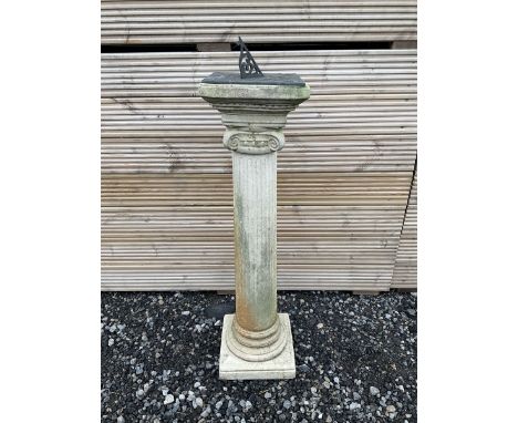 Composite stone sundial, on Ionic fluted column and stepped circular and square footed base - THIS LOT IS TO BE COLLECTED BY 