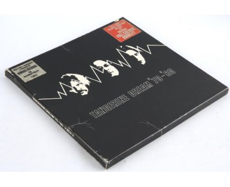 Vinyl record - Tangerine Dream '70 - '80 box set 4 LP and booklet. Condition Report:  foxing to box. 