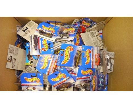 Hot Wheels, A collection of factory sealed 1:64 scale vehicles, 2000s, including private, competition and commercial models, 