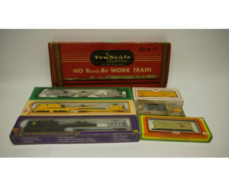 American HO Gauge Freight and Work Train Rolling Stock by Various Makers, including three crane-wagon sets in different colou