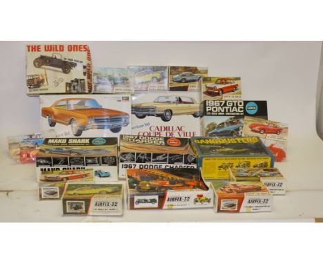 Plastic Kits Constructed and Unmade, A collection of vintage models including four unmade kits comprising two 1:24 scale Hase