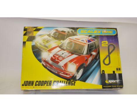 Modern Scalextric and a Radio Controlled Tiger Tank, A boxed John Cooper Challenge racing set with one original car, and two 