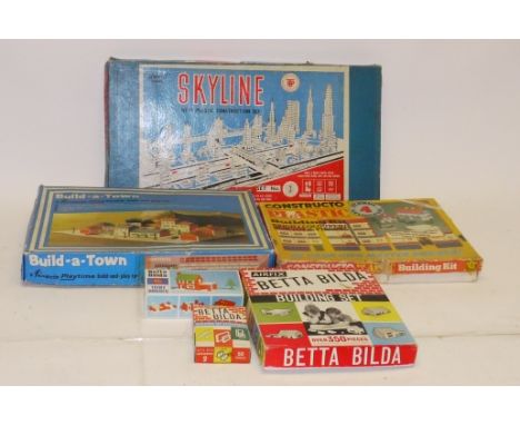 Post-war and Modern Dolls Houses and Construction Sets, A group of printed tin dolls houses/ garages including a Mettoy examp