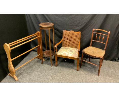 An Edwardian mahogany two tier plant stand, 93.5cm high,  19th century bobbin turned chair, rush seat;   bergere arm chair;  