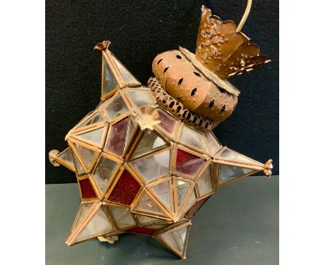 A patinated metal, red and clear glass star lantern, possibly Moroccan, approx 40cm x 27cm 