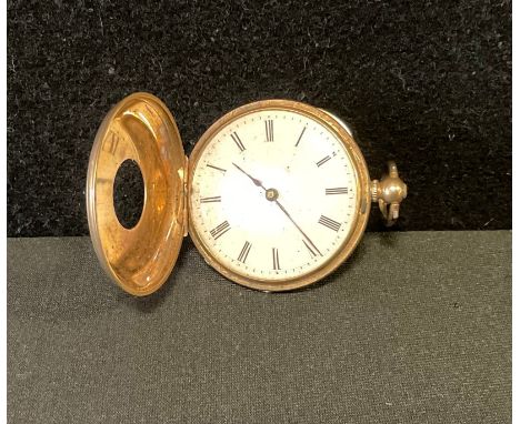 A Continental 14ct gold lady's half hunter fob watch, engine turned case, white dial, Roman numerals, key wind movement, stam