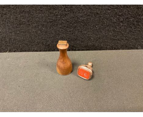 A 19th century carnelian seal stamp, rolled gold mount, initialled GR;  another wooden W A R (2) 