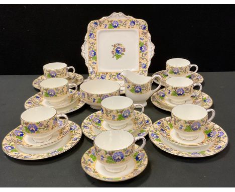 A Paragon tea set, for six, decorated with blue flowers, pattern no 21092 inc cups, saucers, side plates, jug etc 