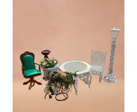 A selection of 1:12 scale dollshouse items to include white wire table, chair, obelisk, two floral displays, office chair and