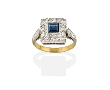 An 18 Carat Gold Sapphire and Diamond Cluster Ring, the square-shaped sapphire within a border of eight-cut diamonds, in whit