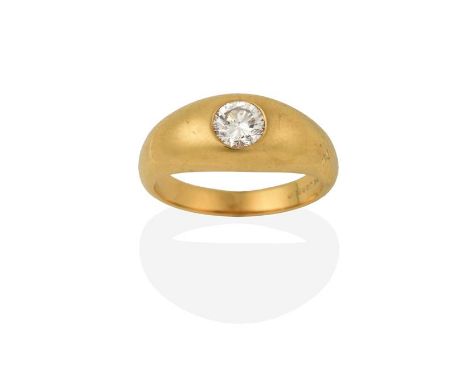 A Diamond Solitaire Ring, the round brilliant cut diamond inset within a yellow plain polished shank, estimated diamond weigh