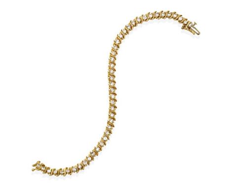 A Diamond Line Bracelet, the round brilliant cut diamonds in yellow claw settings, spaced by undulating plain polished bars, 