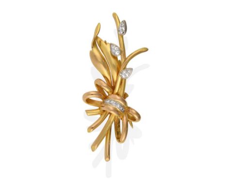 A Diamond Brooch, the yellow floral spray gathered by a ribbon motif, set throughout with eight-cut diamonds, total estimated