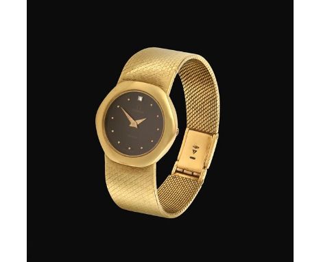 A Lady's 18 Carat Gold Wristwatch, signed Omega, circa 1975, quartz movement, black dial with dot markers and a diamond set m