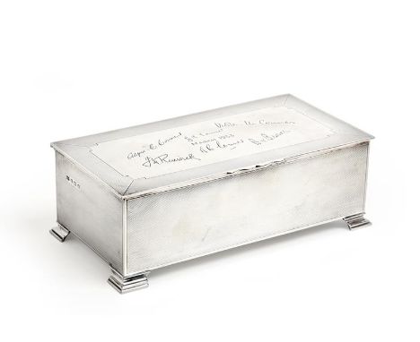 A George VI Silver Cigarette-Box, by Mappin and Webb, Birmingham, 1947, oblong and on four stepped feet, the sides and hinged