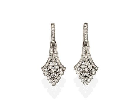 A Pair of Diamond Drop Earrings, each tapering openwork fan design set throughout with round brilliant cut diamonds, in white