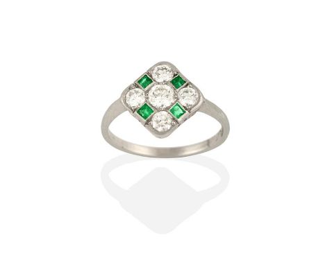 An Art Deco Style Emerald and Diamond Ring, the round brilliant cut diamond within a border of smaller round brilliant cut di