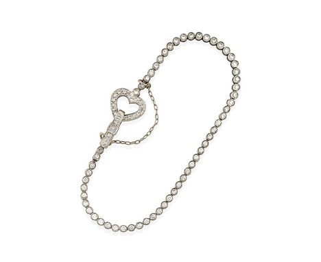 A Diamond Line Bracelet, the round brilliant cut diamonds in white rubbed over settings, terminating to a heart and buckle cl