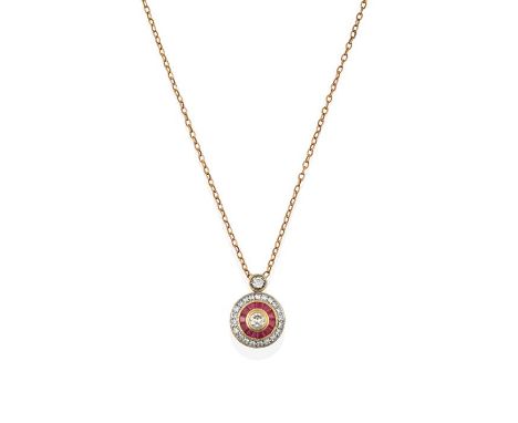 A Ruby and Diamond Cluster Pendant on Chain, a round brilliant cut diamond within a border of calibré cut rubies, to a furthe