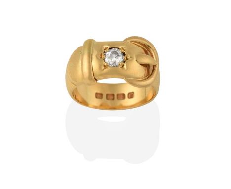 An 18 Carat Gold Diamond Buckle and Belt Ring, an old cut diamond in a yellow star setting, to a buckle motif shank, estimate