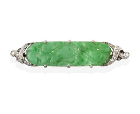 A Jade and Diamond Bar Brooch, circa 1935, the rounded rectangular carved and pierced jade panel with eight-cut diamond set t