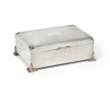A George V Silver Cigarette-Box, by Charles S. Green and Co. Ltd., Birmingham, Probably 1934, oblong and on four stepped feet