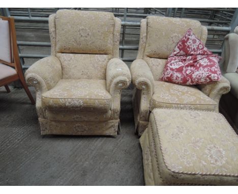 Two modern armchairs and pouffe, gold floral