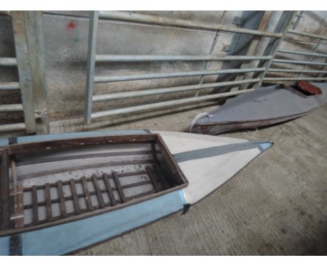 Two vintage canoes